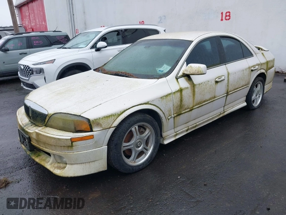 2000 Lincoln LS with VIN 1LNHM87A5YY873918, listed as a IAAI auction lot 41988309 with 1 mi miles. Bid and sale history available at carsss.com. Image 2.