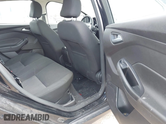 2017 Ford Focus SE with VIN 1FADP3F2XHL263071, listed as a IAAI auction lot 42046106 with 91,633 mi miles and . Bid and sale history available at DreamBid. Image 8.