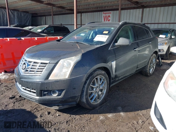 2014 Cadillac SRX Premium Collection z VIN 3GYFNDE34ES581728, wystawiony jako IAAI lot #41578226 z przebiegiem 121 118 mil mil oraz . Historia ofert i sprzedaży dostępna na DreamBid. Obrazek 2.