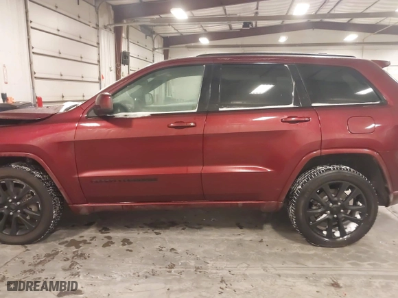 2018 Jeep Grand Cherokee Laredo E with VIN 1C4RJFAG9JC436803, listed as a IAAI auction lot 41572437 with 106,941 mi miles. Bid and sale history available at carsss.com. Image 14.