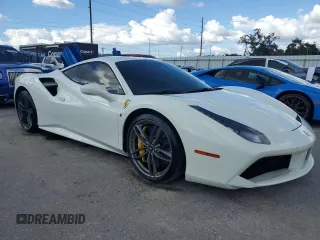 2016 Ferrari 488 z VIN ZFF79ALAXG0216223, wystawiony jako Copart lot #74210804 z przebiegiem Nie podano mil oraz Szkody całkowita. Historia ofert i sprzedaży dostępna na DreamBid. Obrazek 4.
