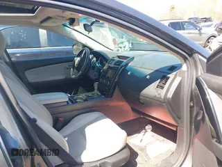 2015 Mazda CX-9 Touring with VIN JM3TB3CV1F0461854, listed as a IAAI auction lot 42068299 with 128,124 mi miles. Bid and sale history available at carsss.com. Image 5.