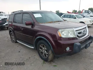 2010 Honda Pilot EX-L z VIN 5FNYF4H58AB023439, wystawiony jako IAAI lot #42384163 z przebiegiem 232 838 mil mil oraz . Historia ofert i sprzedaży dostępna na DreamBid. Obrazek 1.