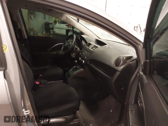 2012 Mazda 5 Touring z VIN JM1CW2CL1C0107706, wystawiony jako IAAI lot #41551479 z przebiegiem 123 418 mil mil oraz . Historia ofert i sprzedaży dostępna na DreamBid. Obrazek 5.