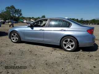 2013 BMW 3 Series 328i xDrive with VIN WBA3B3C55DF530996, listed as a Copart auction lot 54433365 with 130,986 mi miles and Clean Title. Bid and sale history available at DreamBid. Image 2.