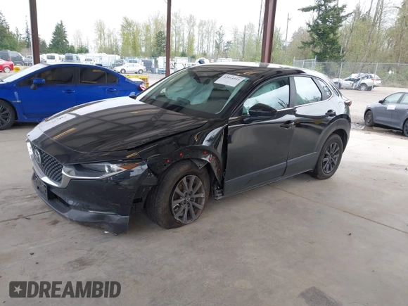2024 Mazda CX-30 2.5 S with VIN 3MVDMBAM5RM633007, listed as a IAAI auction lot 42014511 with 11,895 mi miles. Bid and sale history available at carsss.com. Image 17.
