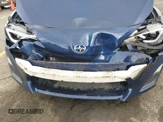 2015 Scion FR-S z VIN JF1ZNAA11F8709669, wystawiony jako IAAI lot #41794094 z przebiegiem 109 940 mil mil oraz . Historia ofert i sprzedaży dostępna na DreamBid. Obrazek 6.