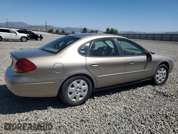 2003 Ford Taurus LX Standard z VIN 1FAFP52U63G277370, wystawiony jako Copart lot #56184345 z przebiegiem 115 778 mil mil oraz Szkoda całkowita • Salvage title. Historia ofert i sprzedaży dostępna na DreamBid. Obrazek 3.