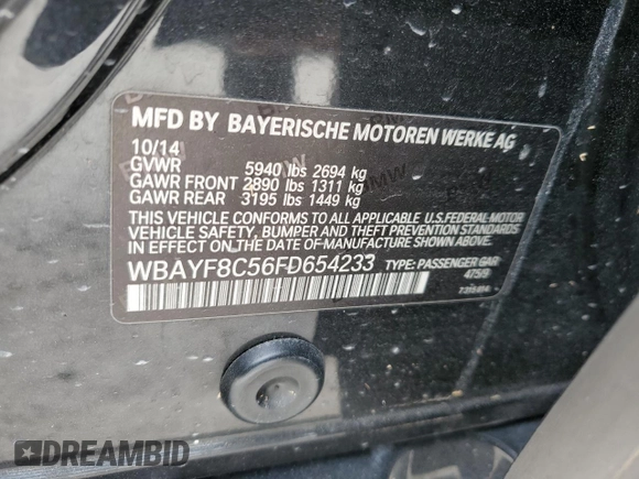 2015 BMW 7 Series 750Li xDrive z VIN WBAYF8C56FD654233, wystawiony jako Copart lot #83321604 z przebiegiem Nie podano mil oraz Nie do naprawy • Non repairable. Historia ofert i sprzedaży dostępna na DreamBid. Obrazek 13.