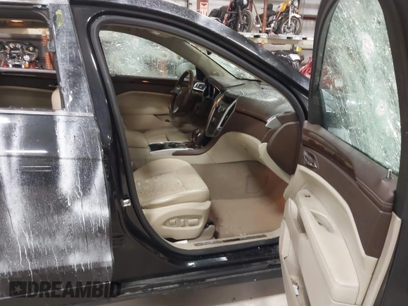 2011 Cadillac SRX Performance Collection with VIN 3GYFNEEY3BS560107, listed as a IAAI auction lot 42017220 with 243,740 mi miles and . Bid and sale history available at carsss.com. Image 5.