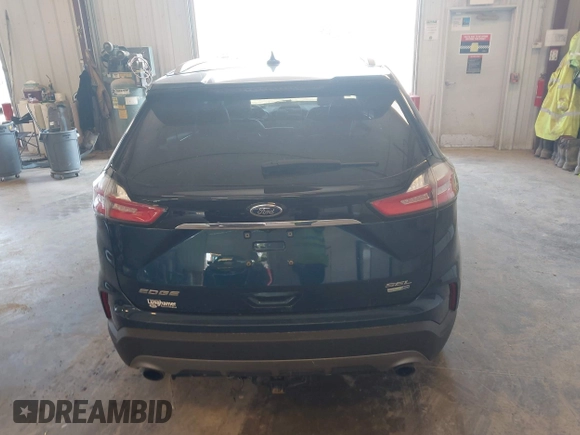 2020 Ford Edge SEL with VIN 2FMPK4J90LBA09924, listed as a IAAI auction lot 42514596 with 100,275 mi miles and . Bid and sale history available at DreamBid. Image 16.