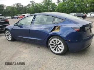 2023 Tesla Model 3 with VIN 5YJ3E1EA5PF695318, listed as a Copart auction lot 53832935 with 28,863 mi miles and Salvage title. Bid and sale history available at DreamBid. Image 2.