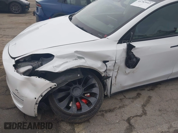 2022 Tesla Model Y Performance with VIN 7SAYGDEF0NF400560, listed as a IAAI auction lot 41783912 with 36,513 mi miles and . Bid and sale history available at DreamBid. Image 19.