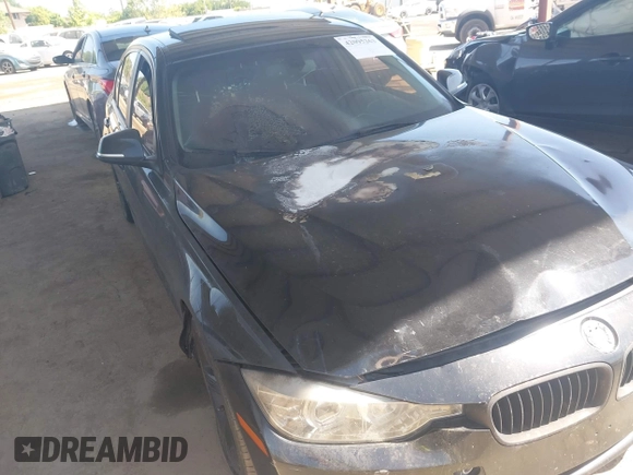 2013 BMW 3 Series 328i with VIN WBA3C1C55DF437400, listed as a IAAI auction lot 42095263 with Not Provided miles and . Bid and sale history available at carsss.com. Image 12.