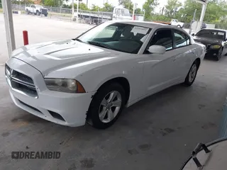 2012 Dodge Charger SE with VIN 2C3CDXBG9CH206975, listed as a IAAI auction lot 42213012 with 150,706 mi miles and . Bid and sale history available at DreamBid. Image 2.