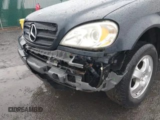 2003 Mercedes-Benz M-Class 3.2L with VIN 4JGAB54EX3A390987, listed as a IAAI auction lot 41482335 with 191,381 mi miles. Bid and sale history available at carsss.com. Image 6.