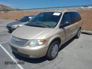 2001 Chrysler Town & Country Limited with VIN 2C8GP64L31R241168, listed as a IAAI auction lot 42094315 with 213,800 mi miles. Bid and sale history available at carsss.com. Image 2.