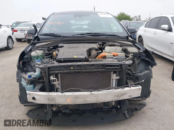 2020 Hyundai Ioniq Blue with VIN KMHC65LCXLU186010, listed as a IAAI auction lot 42019760 with 118,004 mi miles and . Bid and sale history available at DreamBid. Image 13.