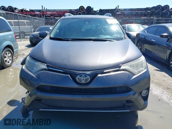 2018 Toyota RAV4 XLE with VIN 2T3WFREV9JW503136, listed as a IAAI auction lot 41815266 with 118,585 mi miles. Bid and sale history available at carsss.com. Image 12.