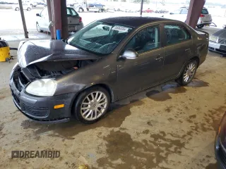 2008 Volkswagen Jetta z VIN 3VWRA71KX8M184883, wystawiony jako Copart lot #85065354 z przebiegiem 210 880 mil mil oraz Szkoda całkowita • Salvage title. Historia ofert i sprzedaży dostępna na DreamBid. Obrazek 1.