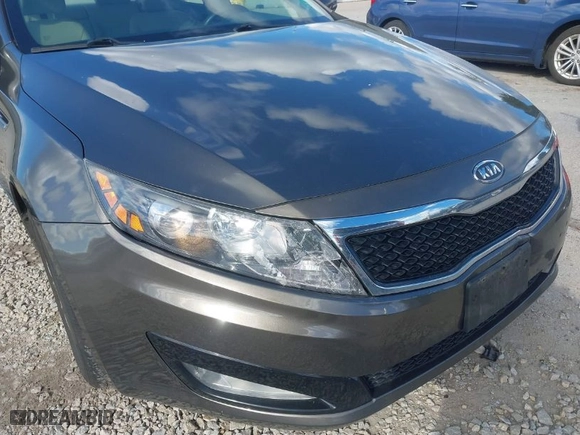 2012 Kia Optima LX with VIN 5XXGM4A72CG083861, listed as a IAAI auction lot 41909434 with 124,526 mi miles. Bid and sale history available at carsss.com. Image 6.
