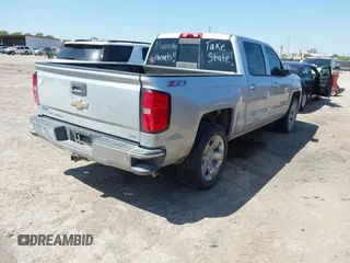2014 Chevrolet Silverado 1500 LTZ with VIN 3GCUKSEC3EG163562, listed as a IAAI auction lot 41978091 with 166,300 mi miles and . Bid and sale history available at DreamBid. Image 4.