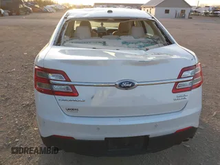 2015 Ford Taurus SEL with VIN 1FAHP2E82FG202143, listed as a IAAI auction lot 42053737 with 113,839 mi miles and . Bid and sale history available at carsss.com. Image 16.