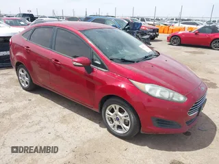 2016 Ford Fiesta SE z VIN 3FADP4BJXGM156814, wystawiony jako IAAI lot #42129721 z przebiegiem 90 353 mil mil oraz . Historia ofert i sprzedaży dostępna na DreamBid. Obrazek 1.