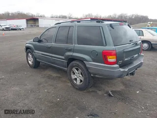2002 Jeep Grand Cherokee Laredo with VIN 1J4GW48NX2C151430, listed as a IAAI auction lot 41886769 with 222,795 mi miles. Bid and sale history available at carsss.com. Image 3.