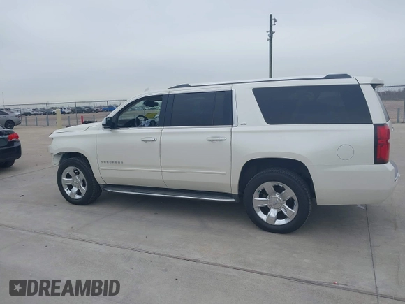2015 Chevrolet Suburban LTZ with VIN 1GNSCKKC7FR641421, listed as a IAAI auction lot 41637137 with 139,001 mi miles and . Bid and sale history available at DreamBid. Image 14.