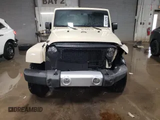 2011 Jeep Wrangler Sahara with VIN 1J4AA5D19BL577347, listed as a Copart auction lot 80340124 with 148,986 mi miles and Salvage Title. Bid and sale history available at DreamBid. Image 5.