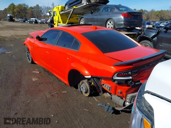 2023 Dodge Charger Scat Pack Widebody with VIN 2C3CDXGJ4PH670928, listed as a IAAI auction lot 41492124 with 64 mi miles and . Bid and sale history available at DreamBid. Image 3.