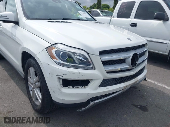 2014 Mercedes-Benz GL 450 z VIN 4JGDF7CE0EA424081, wystawiony jako IAAI lot #42359465 z przebiegiem 145 363 mil mil oraz . Historia ofert i sprzedaży dostępna na DreamBid. Obrazek 19.