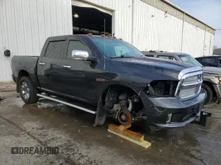 2015 Ram 1500 Laramie Longhorn with VIN 1C6RR7PM8FS633140, listed as a Copart auction lot 82487774 with 100,155 mi miles and Salvage title. Bid and sale history available at DreamBid. Image 4.