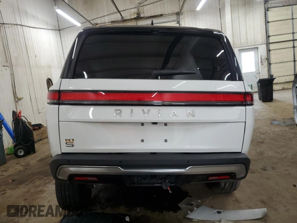 2023 Rivian R1S Adventure z VIN 7PDSGABA2PN013659, wystawiony jako Copart lot #53475945 z przebiegiem 13 928 mil mil oraz Szkody całkowita. Historia ofert i sprzedaży dostępna na DreamBid. Obrazek 6.