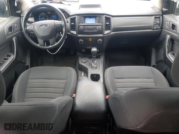 2020 Ford Ranger XL with VIN 1FTER4FHXLLA86940, listed as a Copart auction lot 58614045 with 77,249 mi miles and Salvage title. Bid and sale history available at DreamBid. Image 8.