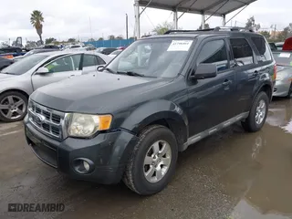 2009 Ford Escape Limited with VIN 1FMCU04759KB64236, listed as a IAAI auction lot 41796461 with 214,949 mi miles. Bid and sale history available at carsss.com. Image 2.