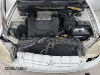 2000 Hyundai Sonata GLS with VIN KMHWF35V0YA347621, listed as a Copart auction lot 76346874 with 164,489 mi miles and Salvage Title. Bid and sale history available at carsss.com. Image 11.
