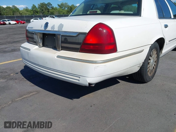2006 Mercury Grand Marquis LS Premium z VIN 2MEFM75V46X614439, wystawiony jako IAAI lot #42319947 z przebiegiem 125 715 mil mil oraz . Historia ofert i sprzedaży dostępna na DreamBid. Obrazek 14.