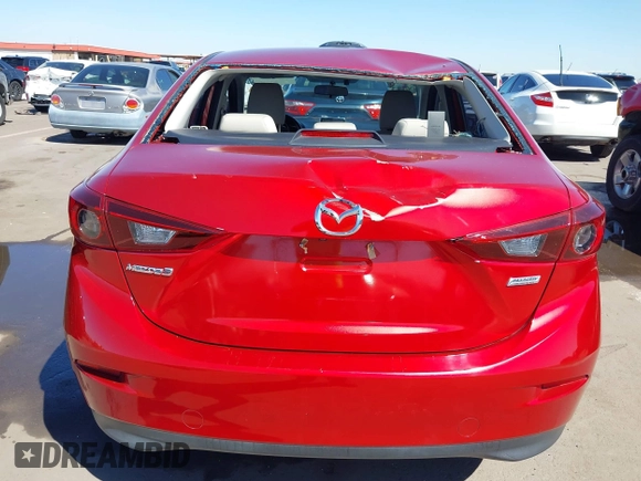 2016 Mazda Mazda3 i Sport with VIN JM1BM1U71G1345696, listed as a IAAI auction lot 41845701 with 141,646 mi miles. Bid and sale history available at carsss.com. Image 6.