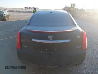 2014 Cadillac XTS Luxury with VIN 2G61M5S32E9289279, listed as a IAAI auction lot 41279495 with 106,655 mi miles. Bid and sale history available at carsss.com. Image 17.