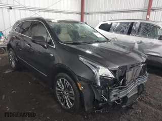 2019 Cadillac XT5 Luxury FWD with VIN 1GYKNCRS6KZ123035, listed as a IAAI auction lot 41588690 with 82,365 mi miles. Bid and sale history available at carsss.com. Image 1.