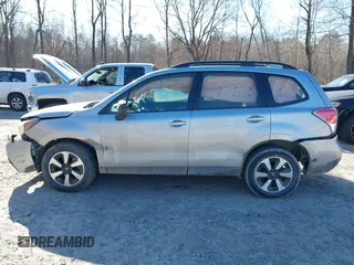 2017 Subaru Forester with VIN JF2SJABC3HH468807, listed as a IAAI auction lot 42042839 with 95,890 mi miles and . Bid and sale history available at DreamBid. Image 14.