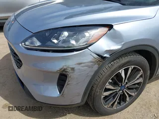 2022 Ford Escape SE z VIN 1FMCU0G68NUB64197, wystawiony jako IAAI lot #42279268 z przebiegiem 10 579 mil mil oraz . Historia ofert i sprzedaży dostępna na DreamBid. Obrazek 6.