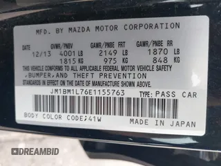 2014 Mazda 3 i Touring z VIN JM1BM1L76E1155763, wystawiony jako IAAI lot #42684723 z przebiegiem 84 837 mil mil oraz . Historia ofert i sprzedaży dostępna na DreamBid. Obrazek 9.