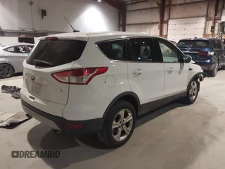 2016 Ford Escape SE with VIN 1FMCU9GX2GUB93968, listed as a IAAI auction lot 41711240 with 153,636 mi miles. Bid and sale history available at carsss.com. Image 4.