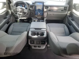 2024 Ford F-150 Lightning Flash with VIN 1FT6W3L7XRWG19735, listed as a Copart auction lot 54361215 with 7,764 mi miles and Salvage Title. Bid and sale history available at DreamBid. Image 8.