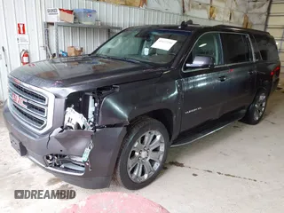 2015 GMC Yukon XL SLT with VIN 1GKS2HKC6FR667110, listed as a IAAI auction lot 41472250 with 141,383 mi miles. Bid and sale history available at carsss.com. Image 17.