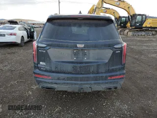 2021 Cadillac XT6 AWD Sport z VIN 1GYKPHRSXMZ164181, wystawiony jako Copart lot #84267124 z przebiegiem 70 658 mil mil oraz Szkody całkowita. Historia ofert i sprzedaży dostępna na DreamBid. Obrazek 6.