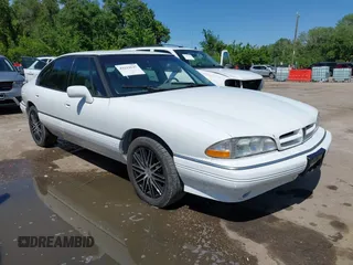 1993 Pontiac Bonneville SE z VIN 1G2HX53L8P1281104, wystawiony jako IAAI lot #42219547 z przebiegiem 113 292 mil mil oraz . Historia ofert i sprzedaży dostępna na DreamBid. Obrazek 1.